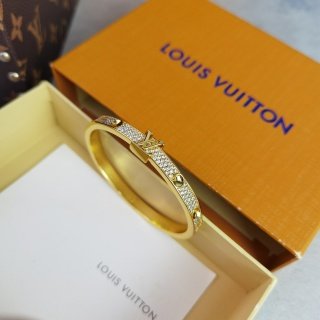 empreinte medium bangle, white gold and diamonds empreinte medium bangle, white gold and diamonds