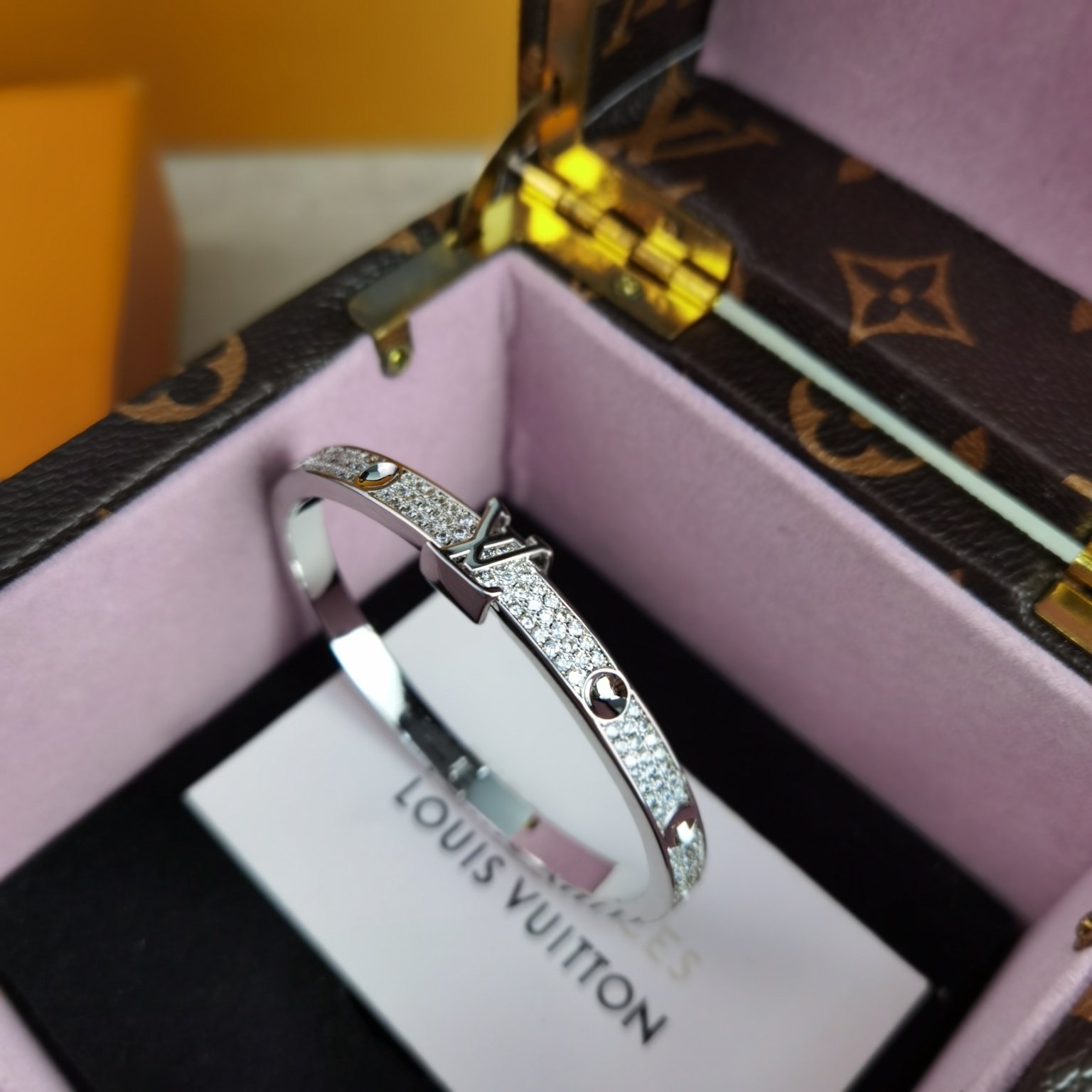 empreinte medium bangle, white gold and diamonds empreinte medium bangle, white gold and diamonds